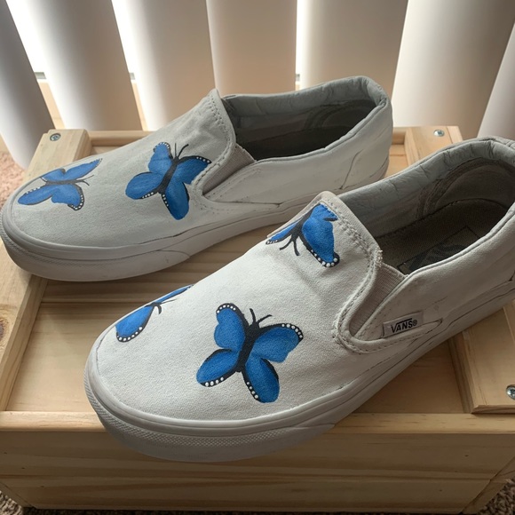 white slip on vans with butterflies